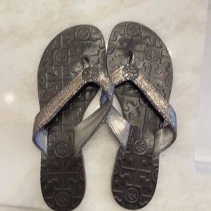 Tory Burch silver bronze flip flops